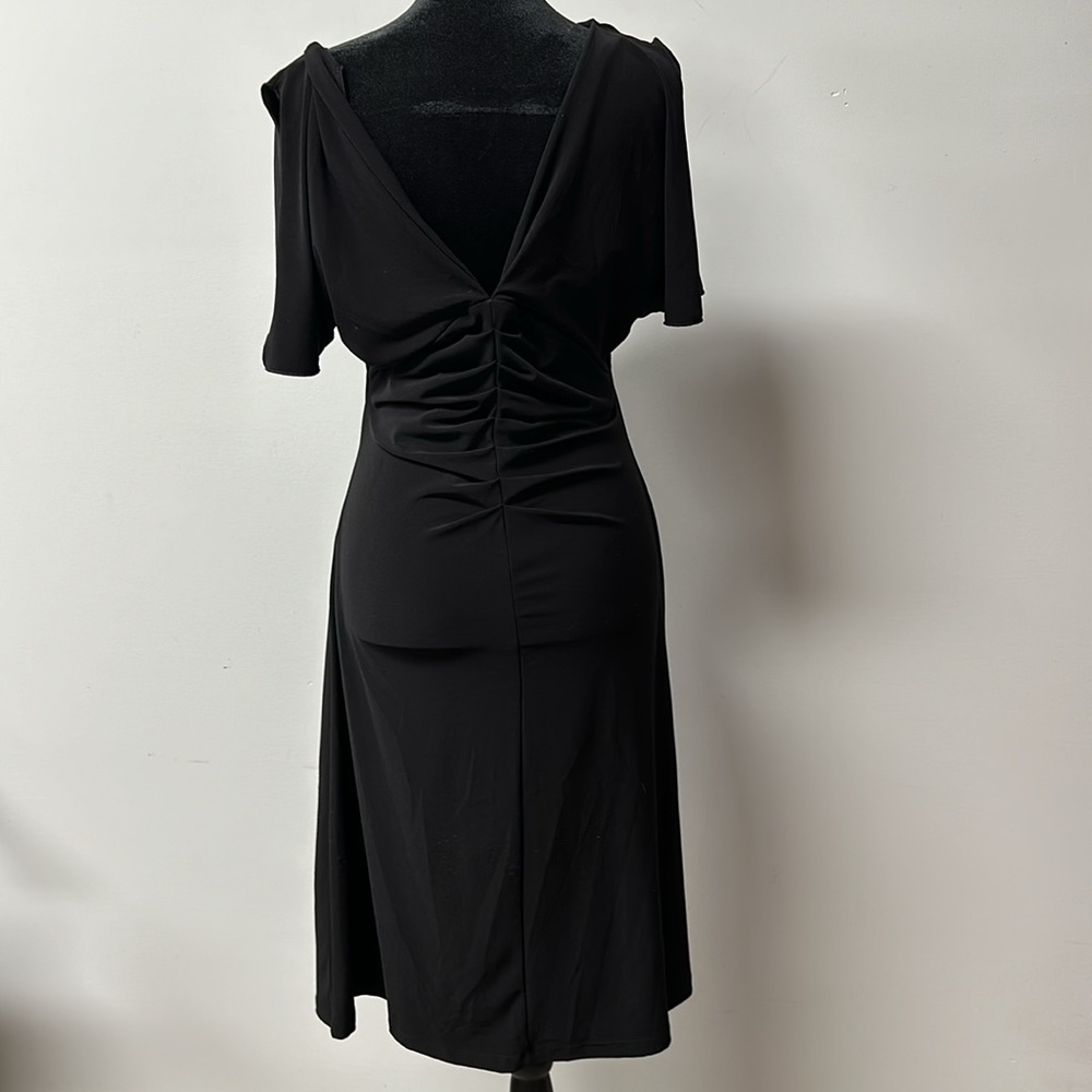 White House Black Market elegant slimming black midi dress size large.